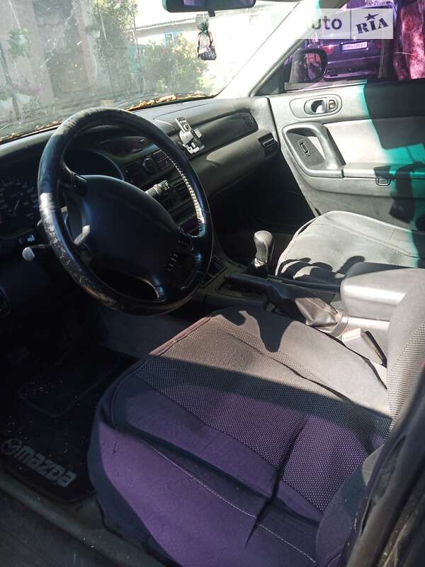 Седан Mazda Xedos 9 1994 в Ромнах