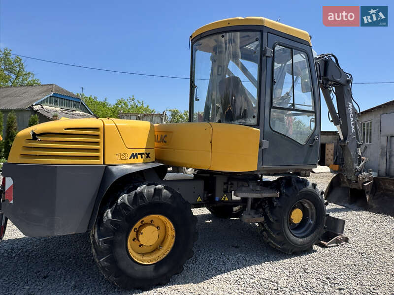 Колісний екскаватор Mecalac 12MXT 2010 в Недобоївцях