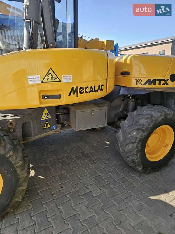 Колесный экскаватор Mecalac 12MXT 2011 в Бучаче фото 27 Колесный экскаватор Mecalac 12MXT 2011 в Бучаче