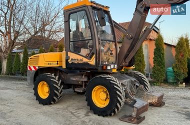 Колесный экскаватор Mecalac 12MXT 2006 в Недобоевцах