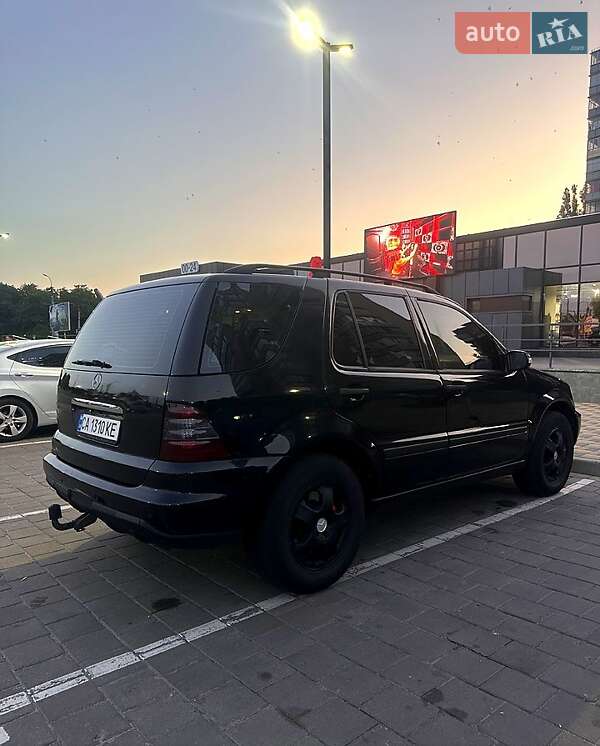 Внедорожник / Кроссовер Mercedes-Benz M-Class 2004 в 