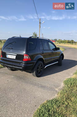 Внедорожник / Кроссовер Mercedes-Benz M-Class 2004 в 