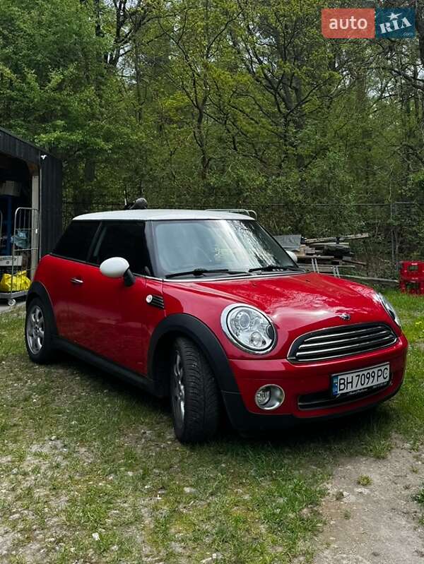 2007 Mini Cooper, VIN WMWMF31050TT70369:plate — фото 1 (autoria)
