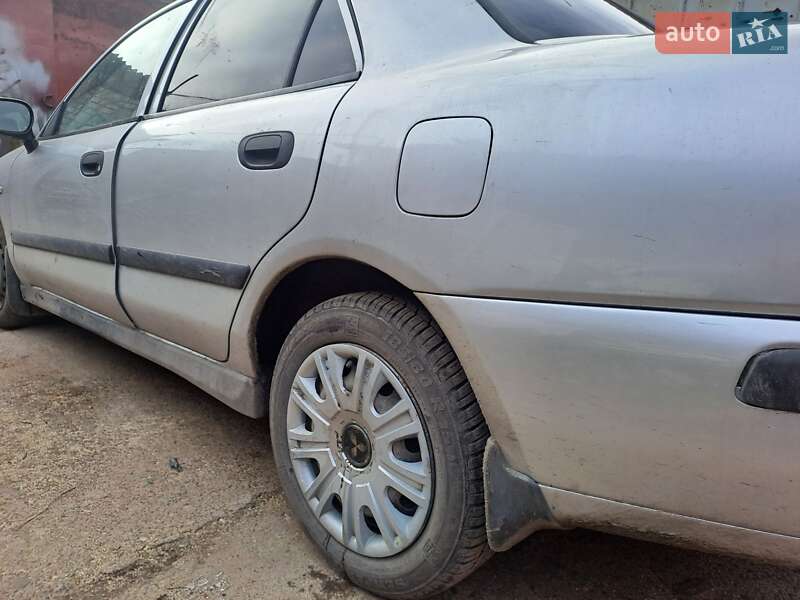 Седан Mitsubishi Carisma 2003 в Сумах