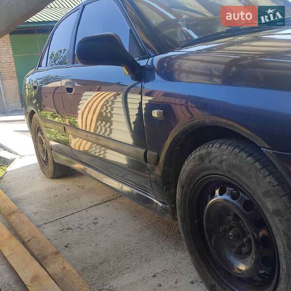 Седан Mitsubishi Carisma 2002 в Винниках