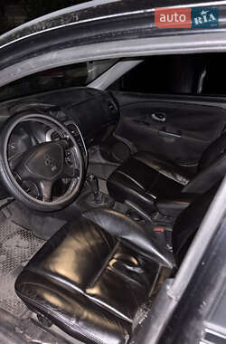 Седан Mitsubishi Carisma 2003 в  фото 2 Седан Mitsubishi Carisma 2003 в