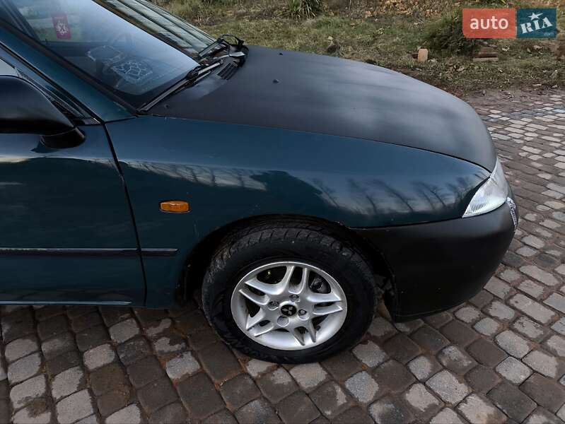 Лифтбек Mitsubishi Carisma 1996 в Надворной фото 24 Лифтбек Mitsubishi Carisma 1996 в Надворной