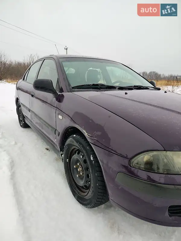Mitsubishi Carisma 2002 VIN XMCLNDA1A2F004900 фото оголошення 7 з 42