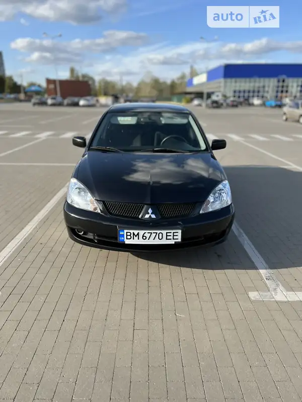 Mitsubishi Lancer 2009 VIN JMBSNCY4A9U002335 фото оголошення 15 з 50