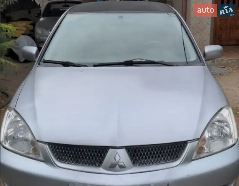 Mitsubishi Lancer 2009 VIN JMBSRCY2A9U004806 фото оголошення 15 з 46