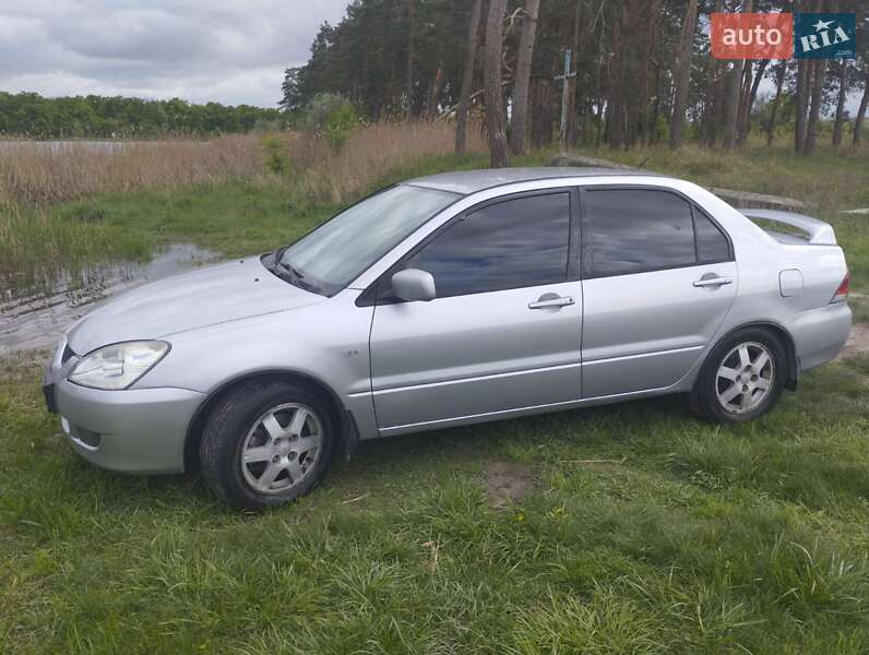 Седан Mitsubishi Lancer 2004 в Новомосковске фото 16 Седан Mitsubishi Lancer 2004 в Новомосковске