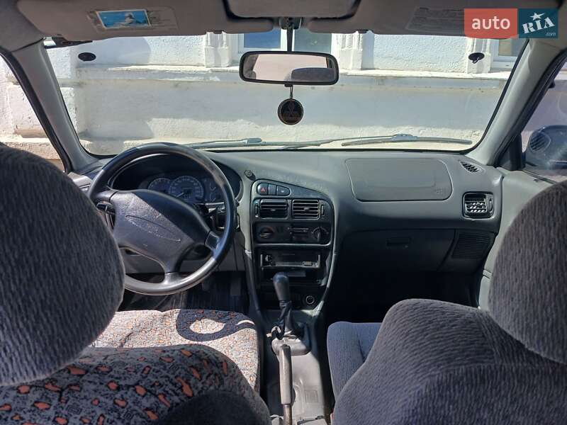 Седан Mitsubishi Lancer 1995 в Городке