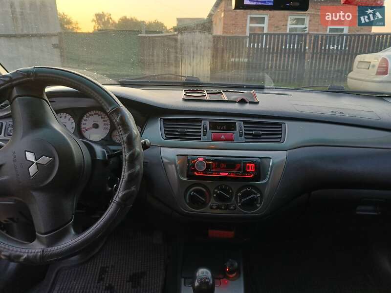 Седан Mitsubishi Lancer 2008 в Ромнах