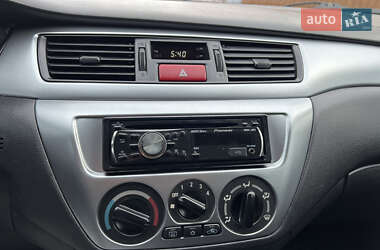 Седан Mitsubishi Lancer 2009 в  фото 42 Седан Mitsubishi Lancer 2009 в