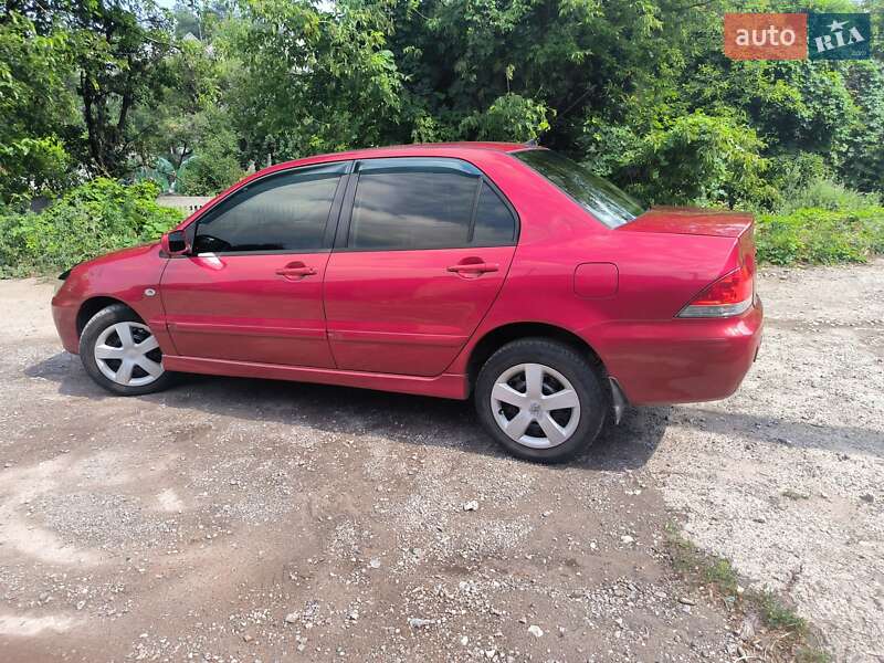 Седан Mitsubishi Lancer 2004 в Каменском фото 3 Седан Mitsubishi Lancer 2004 в Каменском