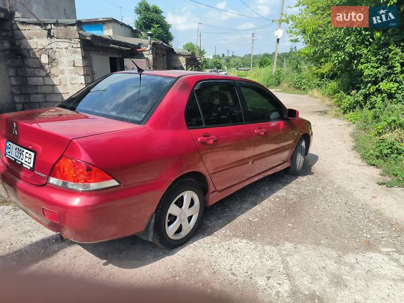 Седан Mitsubishi Lancer 2004 в Каменском фото 6 Седан Mitsubishi Lancer 2004 в Каменском