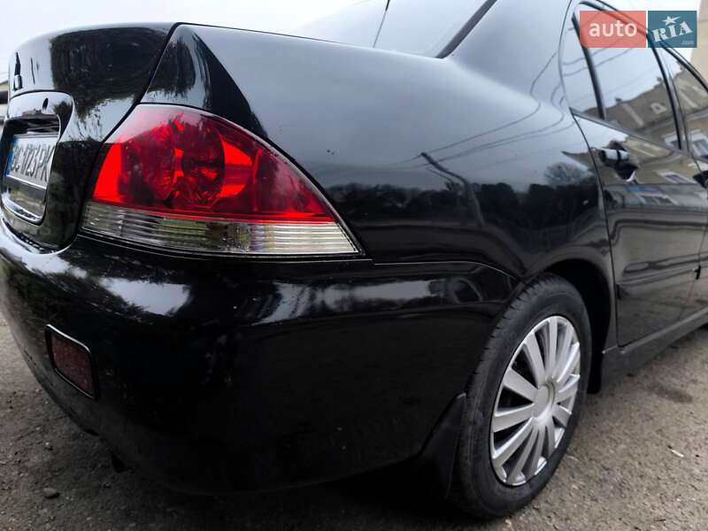 Седан Mitsubishi Lancer 2006 в Рудки