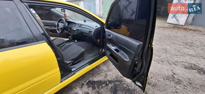 Седан Mitsubishi Lancer 2004 в Кам'янському фото 6 Седан Mitsubishi Lancer 2004 в Кам'янському