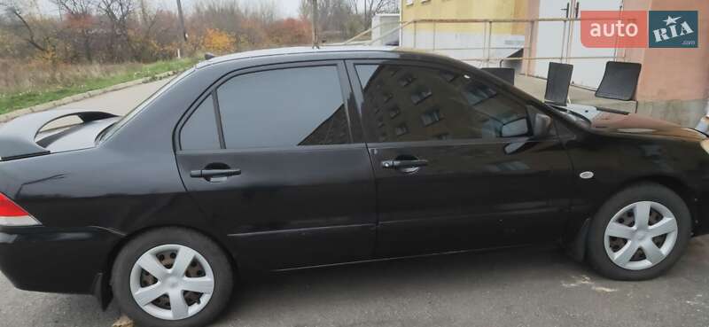 Седан Mitsubishi Lancer 2004 в Новгородці фото 3 Седан Mitsubishi Lancer 2004 в Новгородці