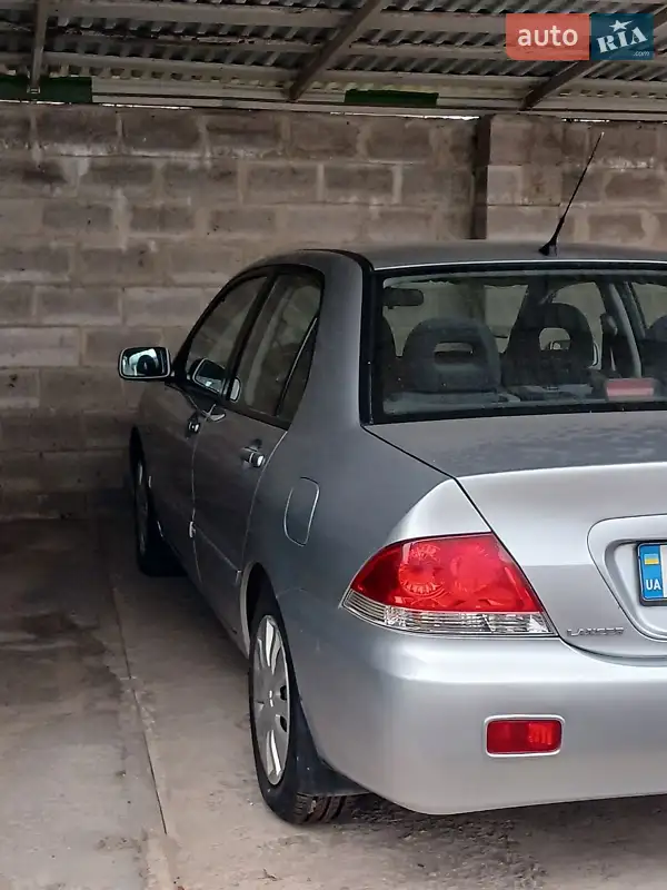 Mitsubishi Lancer 2009 VIN JMBSNCY4A9U002335 фото оголошення 21 з 50