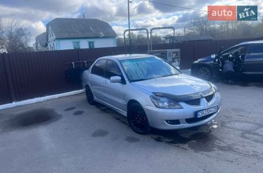 Седан Mitsubishi Lancer 2006 в Мене