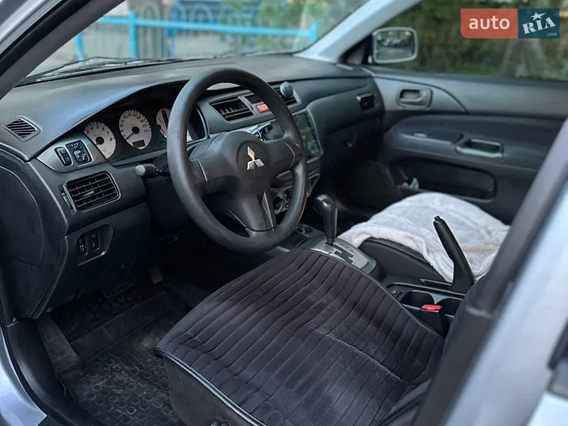 Mitsubishi Lancer 2009 VIN JMBSRCS3A9U000352 фото оголошення 8 з 41