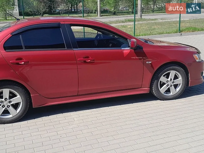 Mitsubishi Lancer 2009 VIN JMBSNCY4A9U002335 фото оголошення 3 з 50