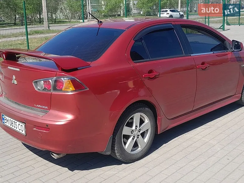 Mitsubishi Lancer 2009 VIN JMBSNCY4A9U002335 фото оголошення 7 з 50