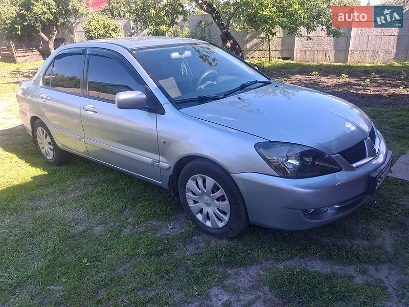 Mitsubishi Lancer 2009 VIN JMBSNCY4A9U002335 фото оголошення 18 з 50