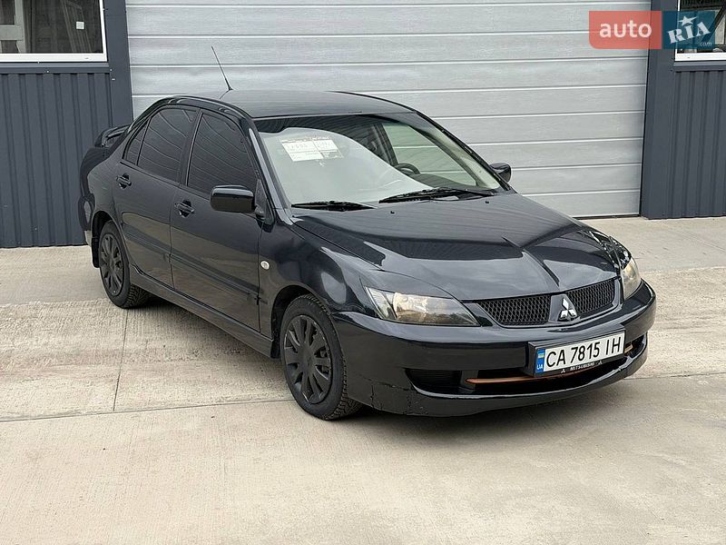 2006 Mitsubishi Lancer, VIN JMBSNCS3A6U009756:plate — фото 1 (autoria)