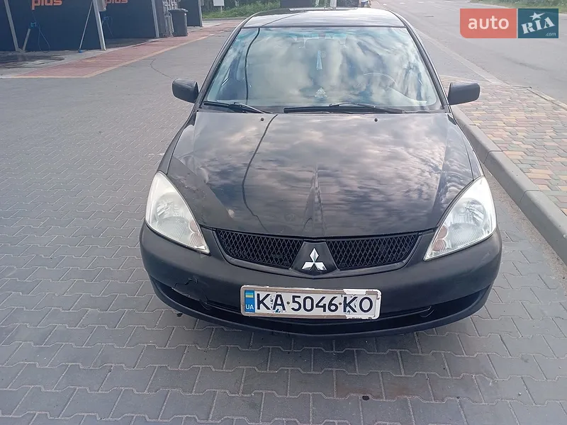 Mitsubishi Lancer 2009 VIN JMBSRCY2A9U004806 фото оголошення 18 з 46