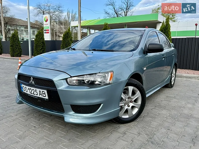 Mitsubishi Lancer 2011 VIN JMBLJCX9ABU001958 фото оголошення 18 з 52