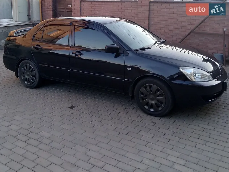 Mitsubishi Lancer 2006 VIN JMBSNCS3A6U028789 фото оголошення 2 з 52