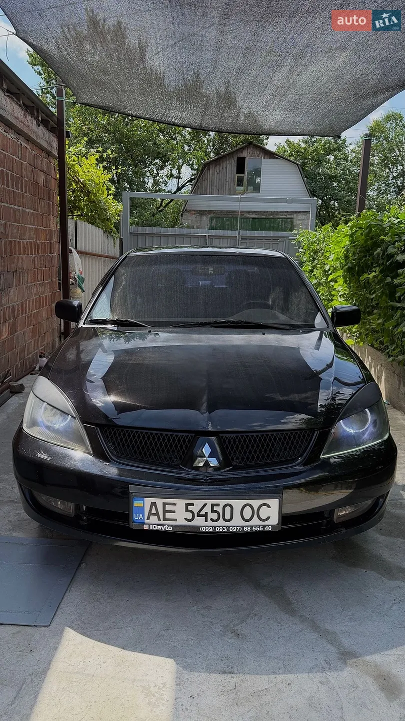 Mitsubishi Lancer 2009 VIN JMBLTCX3A9U002885 фото оголошення 11 з 20