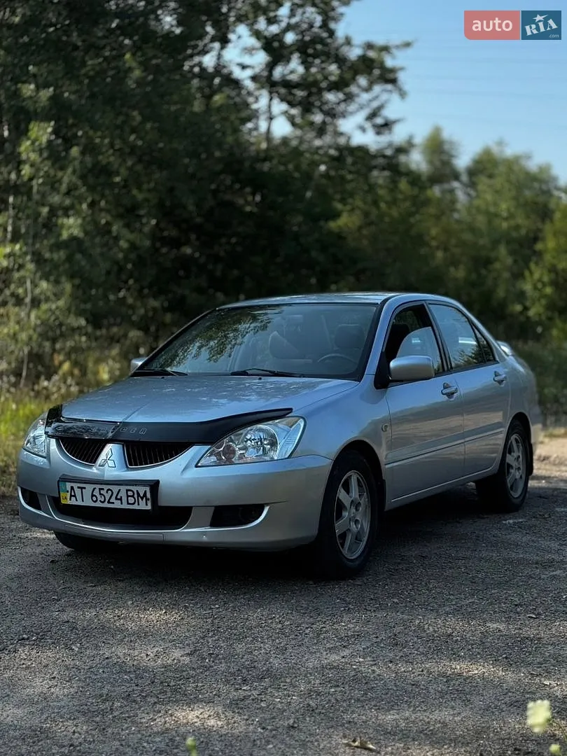 Mitsubishi Lancer 2009 VIN JMBLTCX3A9U002885 фото оголошення 17 з 20