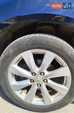Внедорожник / Кроссовер Mitsubishi Outlander Sport 2013 в 