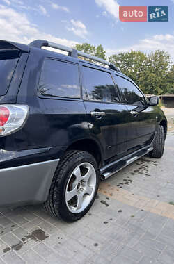 Внедорожник / Кроссовер Mitsubishi Outlander 2004 в 