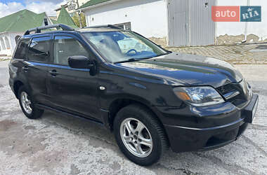 Внедорожник / Кроссовер Mitsubishi Outlander 2004 в 