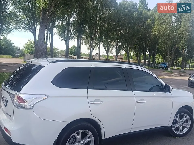 Mitsubishi Outlander 2013 VIN JMBXTGF3WDZ009791 фото оголошення 6 з 37