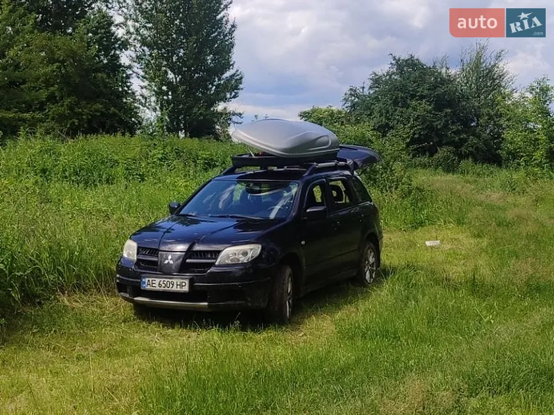 Mitsubishi Outlander 2008 VIN JMBXNCU2W8U002392 фото оголошення 2 з 47