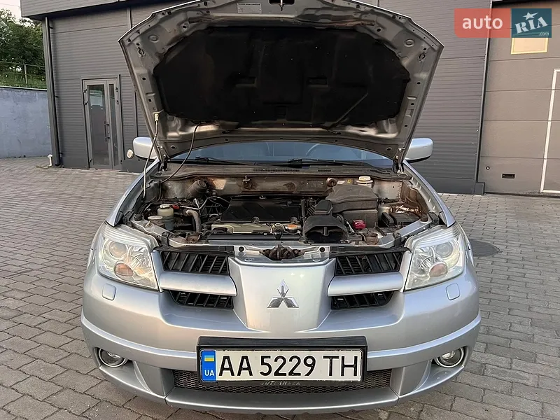 Mitsubishi Outlander 2006 VIN JMBXRCU5W7U000678 фото оголошення 98 з 153