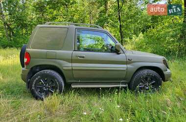 Внедорожник / Кроссовер Mitsubishi Pajero Pinin 1999 в 