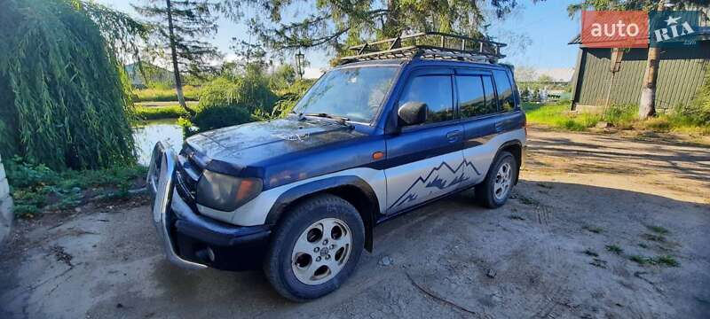 Внедорожник / Кроссовер Mitsubishi Pajero Pinin 1999 в 