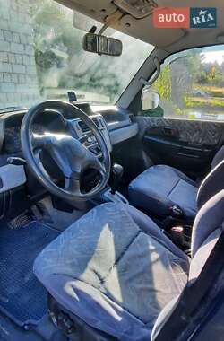 Внедорожник / Кроссовер Mitsubishi Pajero Pinin 1999 в 