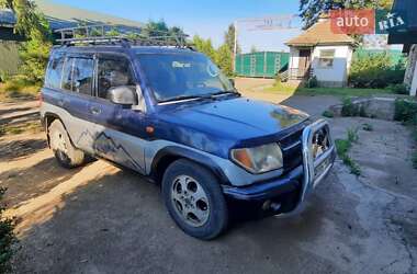 Внедорожник / Кроссовер Mitsubishi Pajero Pinin 1999 в 