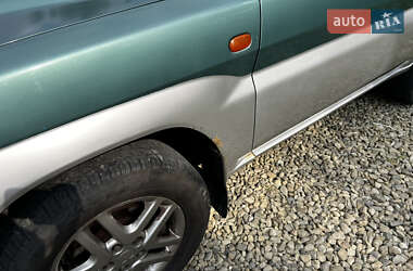 Внедорожник / Кроссовер Mitsubishi Pajero Pinin 2002 в 
