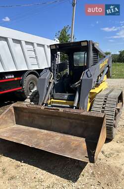 Минипогрузчик New Holland E 215B 2005 в 