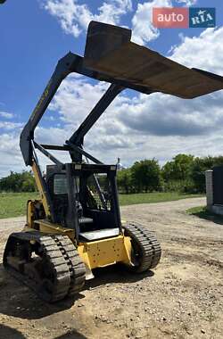 Минипогрузчик New Holland E 215B 2005 в 