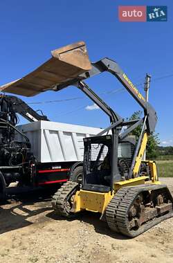 Минипогрузчик New Holland E 215B 2005 в 