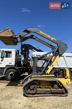 Минипогрузчик New Holland E 215B 2005 в 
